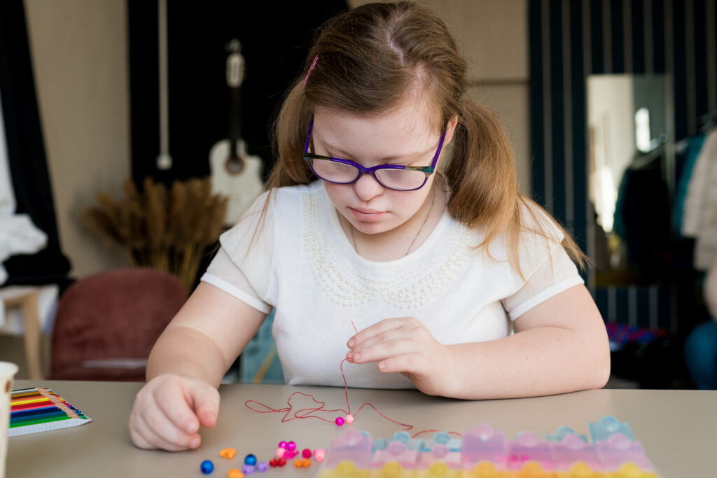 Person with Disability Making Jewelry