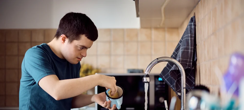 Person with Disability Washing Dishes