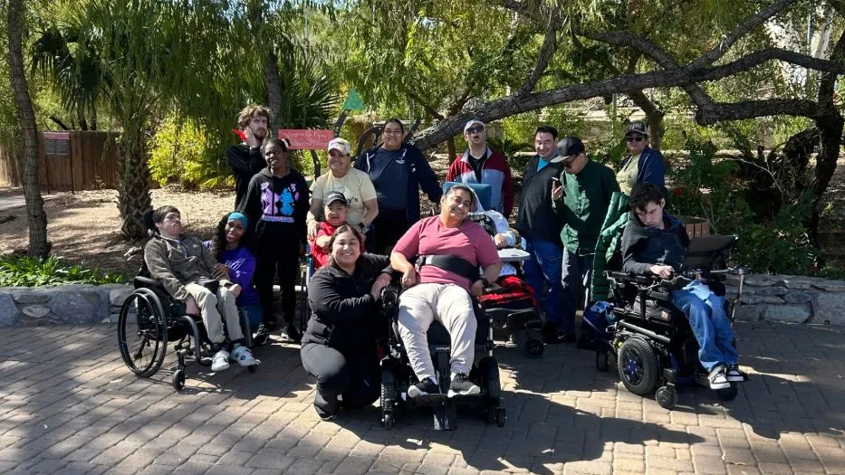 Community outings for adults with IDD at an outdoor nature park with support staff