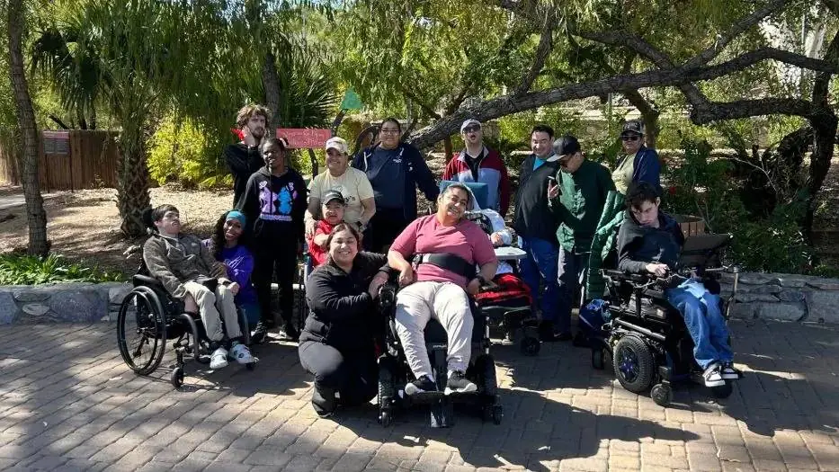 Commaunity outings for individuals with IDD at an outdoor nature park with support staff